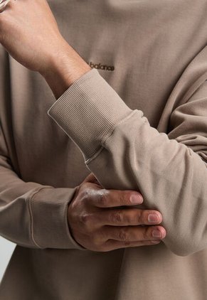 Hoodie new balance Athletics Linear Marrón