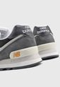 Tenis Lifestyle Beige-Negro-Naranja New Balance 574 de New Balance