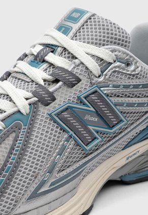 Tenis Lifestyle new balance 1906R Gris