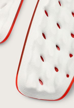 Espinillera  Coral-Negro Nike Mercurial Lite