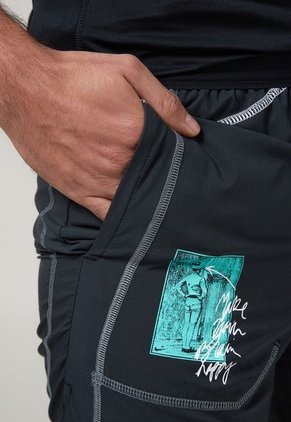 Pantaloneta Negro-Celeste-Blanco Nike Dri-FIT Stride D.Y.E.