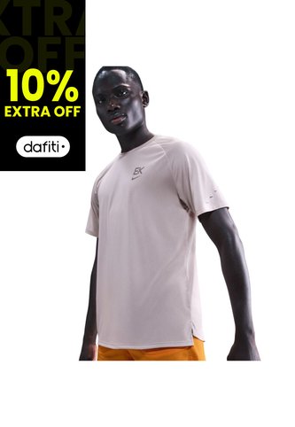 Camiseta Hombre Nike Stride Eliud Kipchoge Beige Nike