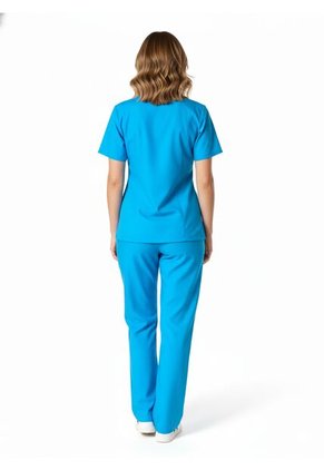 Uniforme Antifluido LS Azul Claro Mujer Origen