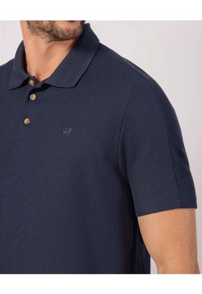 Polo Unicolor Con Detalle En Cuello Para Hombre Azul Patprimo