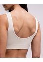 Top Soporte Medio Seamless Vainilla Beige de PUNTO BLANCO