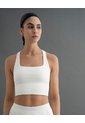 Crop Top Deportivo Soporte Alto Seamless Habano Beige de PUNTO BLANCO