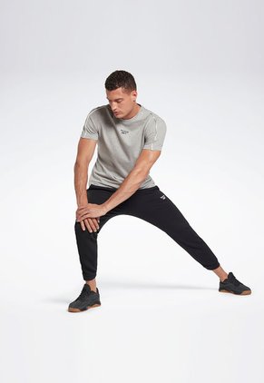 Pantalón Sudadera Negro-Blanco Reebok Workout Ready Piping