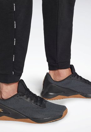 Pantalón Sudadera Negro-Blanco Reebok Workout Ready Piping