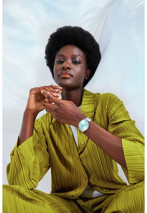 Relojes Swatch Unisex THE GLOW OF IRONY. Acero Inoxidable Plateado SYXS155G