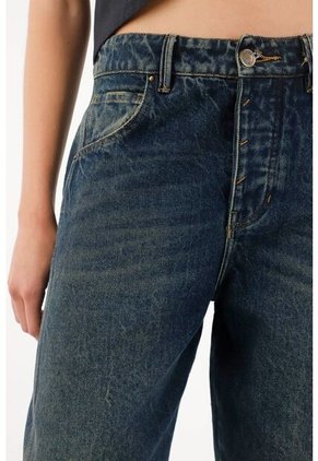 Tennis Jean Horseshoe De Tiro Bajo Azul Oscuro De Ajuste Cómodo Para Mujer