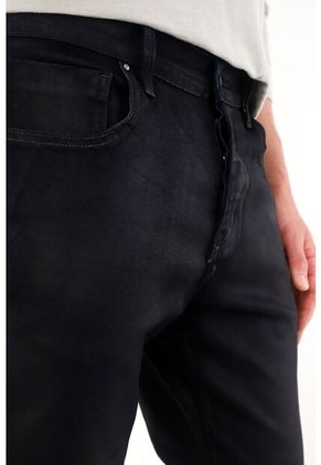 Tennis Jean Super Skinny De Tiro Medio Con Efecto Cuero Para Hombre