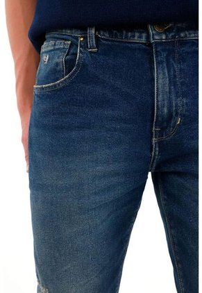 Tennis Jean Nudy Tiro Medio Con Desgastes Para Hombre