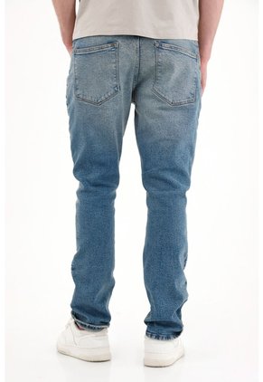 Tennis Jean Nudy Tiro Medio Azul Con Textura Suave Para Hombre