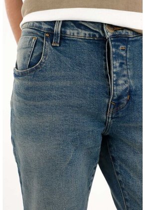 Tennis Jean Skinny Tiro Medio Azul Con Acabado Ligero Para Hombre