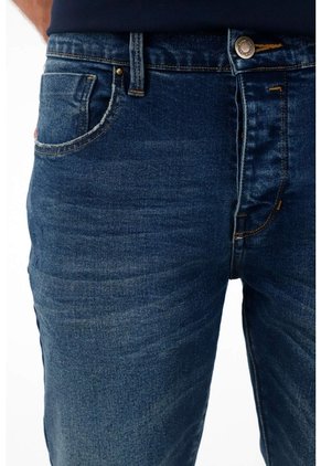Tennis Jean Skinny Cinco Bolsillos Azul De Silueta Amplia Para Hombre