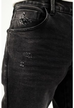 Jean Skinny Con Arrugas 3D Negro Para Hombre