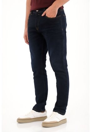 Tennis Jean Skinny Tono Oscuro Azul Con Caída Natural Para Hombre