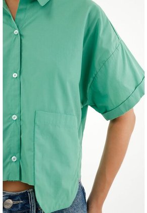 Tennis Camisa Verde Con Ruedo Al Corte Para Mujer