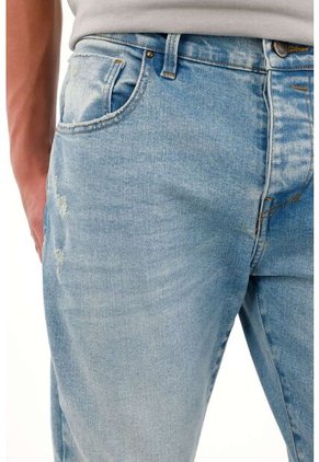 Tennis Jean Skinny Con Desgastes Azul Medio Para Hombre