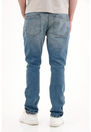 Tennis Jean Nudy Tiro Medio Azul Con Textura Suave Para Hombre