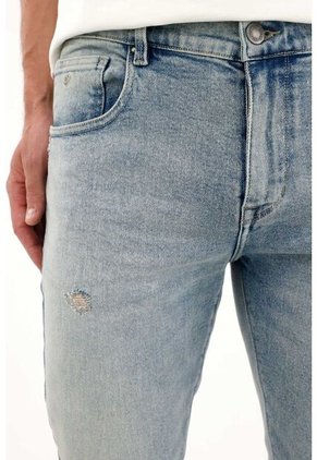 Tennis Jean Nudy Con Desgastes Localizados Azul De Ajuste Relajado Para Hombre Con Detalle único