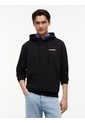 Buzo Negro Con Capota De Corte Regular Con Logo Estampado Tommy Jeans de Tommy Hilfiger