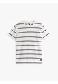 Camiseta Blanca De Rayas Y Cuello Redondo Tommy Jeans de Tommy Hilfiger