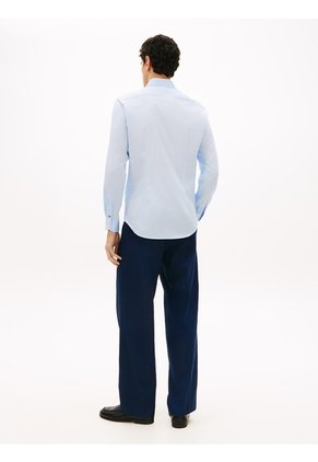 Camisa Celeste De Sarga TH Flex New York Label Con Corte Slim Tommy Hilfiger