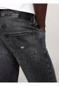 Jeans Gris Scanton Slim Y Desteñidos De Color Negro Tommy Jeans de Tommy Hilfiger