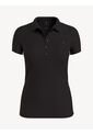 Polo Negro De Corte Slim Con Manga Corta Tommy Hilfiger de Tommy Hilfiger