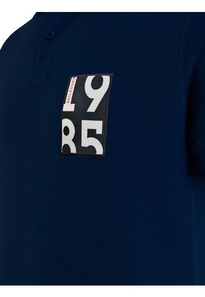 Polo De Corte Regular Con Logo 1985 Hombre Azul Tommy Hilfiger