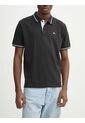 Polo Negro De Corte Regular Con Logo Tommy Jeans de Tommy Hilfiger