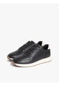 Tenis Negro De Cuero Con Logo En Bajo Relieve Tommy Hilfiger de Tommy Hilfiger