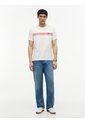 Camiseta Blanca Manga Corta Con Diseño De Rayas Tommy Hilfiger de Tommy Hilfiger