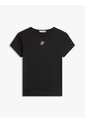 Camiseta Negra De Punto Con Logo Texturizado Tommy Hilfiger de Tommy Hilfiger