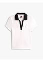 Polo Blanco Con Cuello En V Y Detalles Contrastantes. Tommy Jeans de Tommy Hilfiger