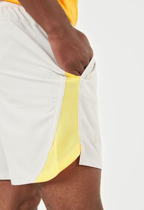 Pantaloneta Beige-Amarillo UNDER ARMOUR