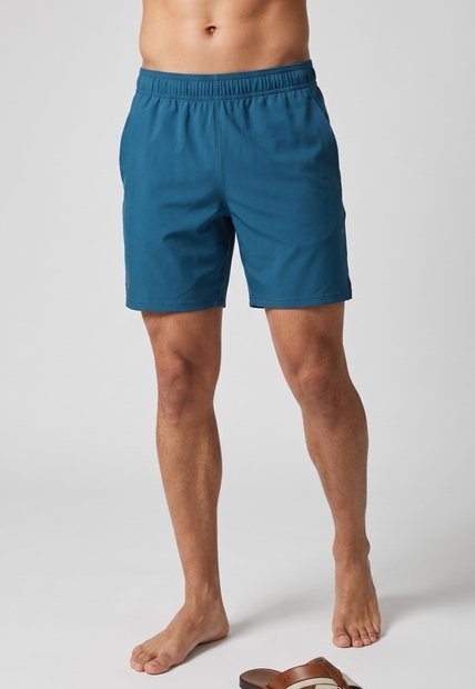 Pantaloneta Training UNDER ARMOUR Woven Wordmark Azul
