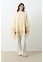 Poncho Tejido Thani Para Mujer Poncho Tejido Thani Para Mujer Crema XL VÉLEZ de Vélez