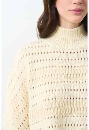 Poncho Tejido Thani Para Mujer Poncho Tejido Thani Para Mujer Crema XL VÉLEZ