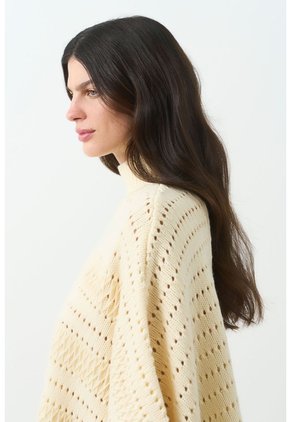 Poncho Tejido Thani Para Mujer Poncho Tejido Thani Para Mujer Crema XL VÉLEZ