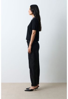 Polo Tejida Manga Corta Para Mujer Almaris Polo Tejida Manga Corta Para Mujer Almaris Negro XL VÉLEZ