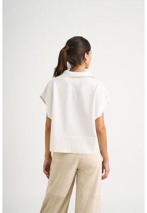 Polo Bora Tejida Para Mujer Silueta Boxy Polo Bora Tejida Para Mujer Silueta Boxy Crema XL VÉLEZ